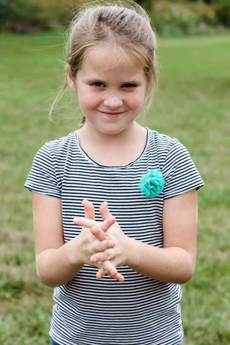 Girl using Alcohol free hand sanitizer