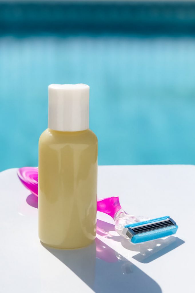 bottle of diy shave butter and women's razor