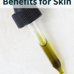 glass dropper of tamanu oil